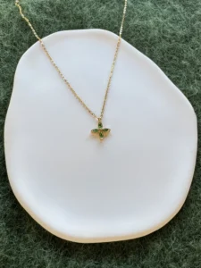 Ατσάλινο Χρυσό Κολιέ με Σταυρό από Πράσινους Κρυστάλλους